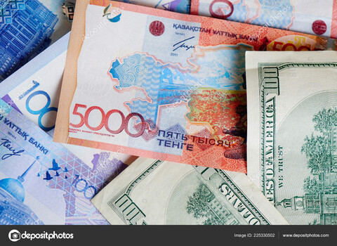 depositphotos 225330502-stock-photo-pile-kazakh-tenge-american-dollars.jpg